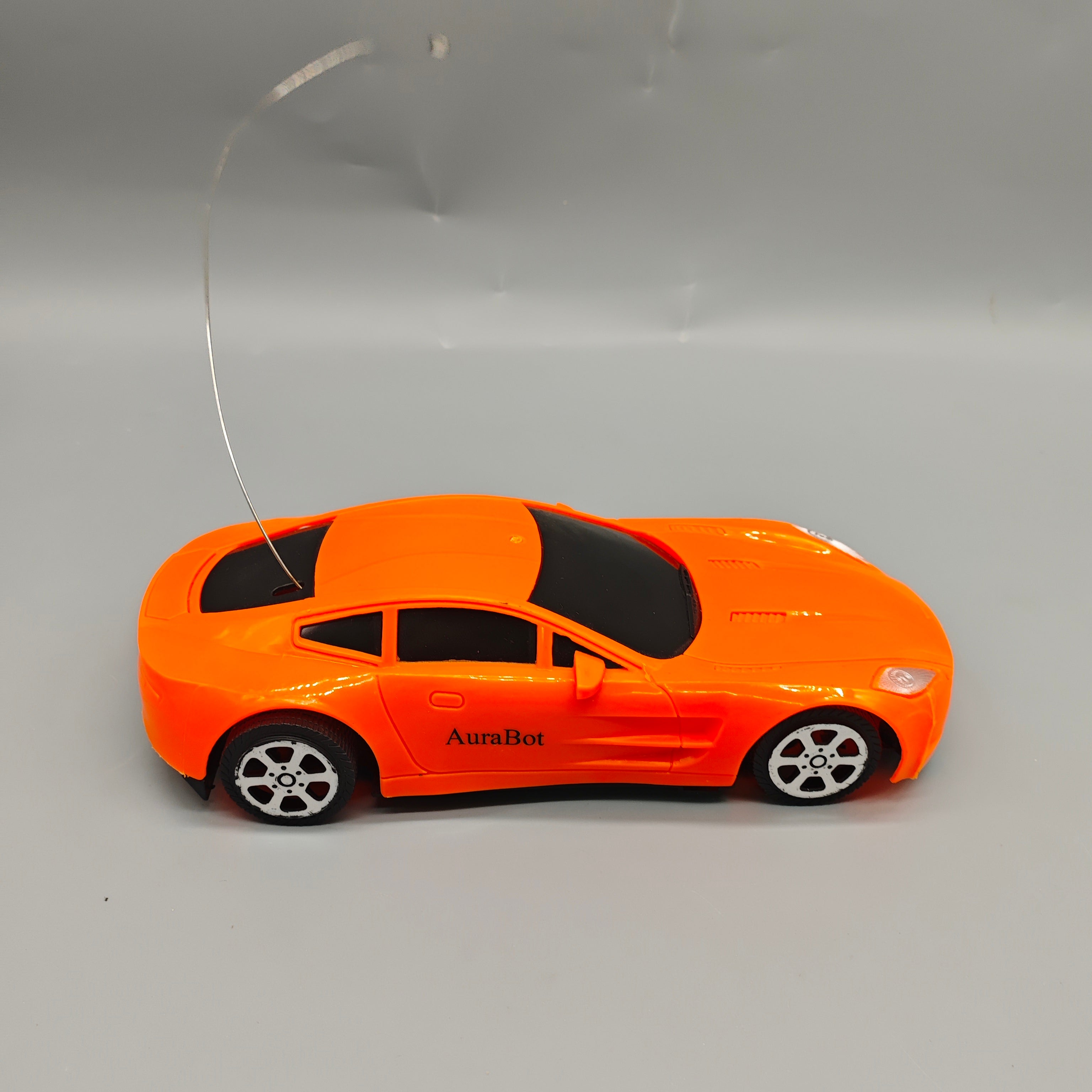 AuraBot Remote-Controlled Toy Vehicles, 180×70×40mm Orange Sports Car with Steering Wheel Controller, Realistic RC Racing Car for Kids